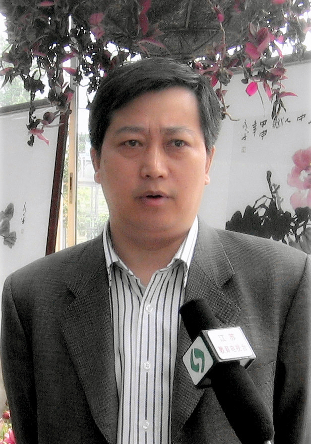 会长成传军